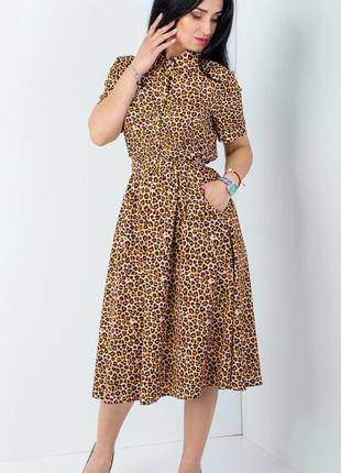 Класне сукні з леопардовим принтом розміри 42,44