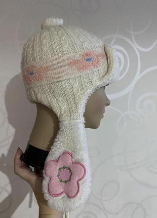 Детская вязаная зимняя шапка ушанка для девочки на меху1 фото
