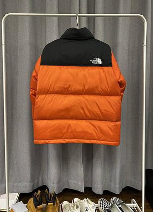 Классный пуховик  tnf 700 orange4 фото