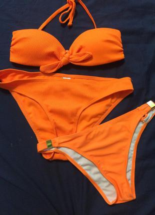 Фирменный купальник в рубчик primark,две пары плавок,неоново оранжевый