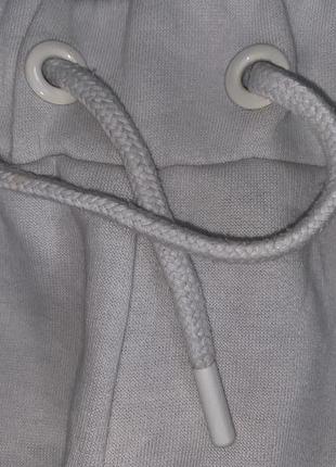 Стильные молочно серые спортивные штаны джоггеры  на байке оригинал primark  размер указан л7 фото