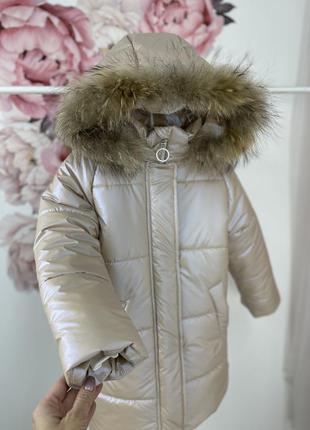 Зимове пальто з хутром єнота