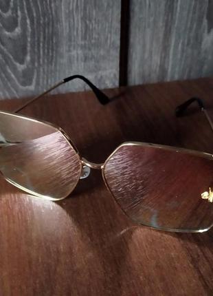 Солнцезащитные очки розовое золото1 фото