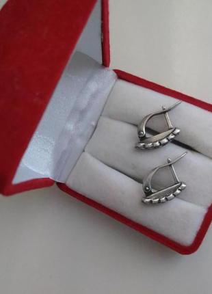 Срібні сережки з англійським замком