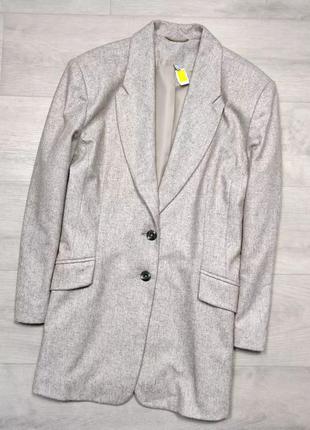 Бежевый шерстяной удлиненный пиджак