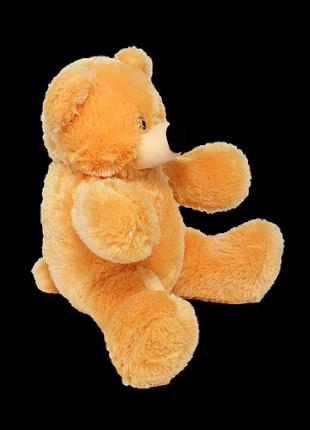 М'яка іграшка - ведмідь сидячий бублик персиковий2 фото