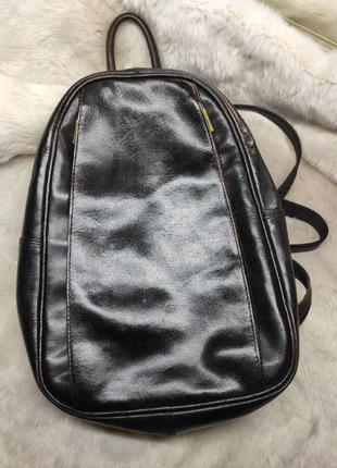 Коричневый кожаный компактный рюкзак 100 % натур. кожа1 фото