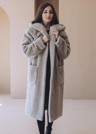 Світла тепла шубка у розмірі с-м