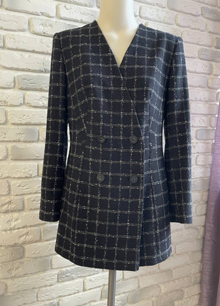 Стильний піджак у клітинку