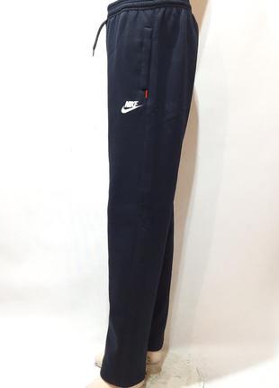 Чоловічі теплі спортивні штани (великих розмірів) прямі, на флісі, чорні1 фото