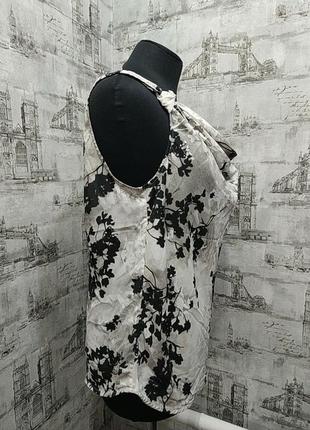 Біла в чорних кольорах майка блузка безрукавка2 фото