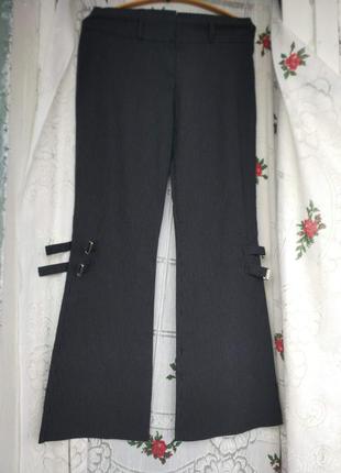 Стильні штани в чорно-білу смужку,р. 504 фото