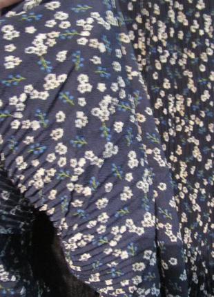 Гофрированная юбка темносинего цвета в мелких белых цветах,8 фото