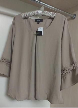 Блуза с резинкой по низу2 фото