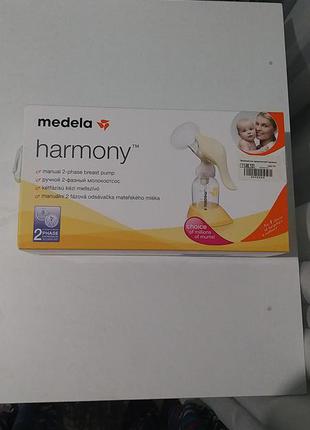 Молокоотсос medela harmony