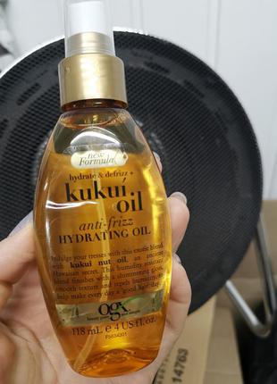 Ogx масло для волос kukui oil.1 фото