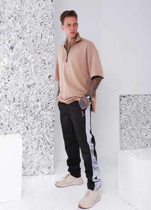 Чоловічі зимові утеплені спортивні штани з плащової тканини на флісі (1635/4черн)5 фото