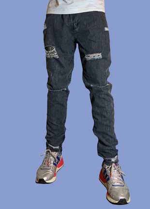Чоловічі джинси з порізами (рвані)1 фото