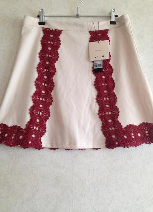 Нова трикотажна біла коротка  спідниця з мереживом