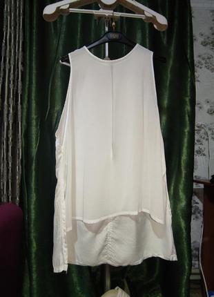Стильная белая блуза с разрезами1 фото