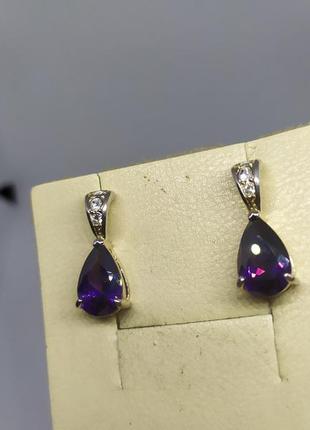 Серьги с камнями аметистового цвета4 фото