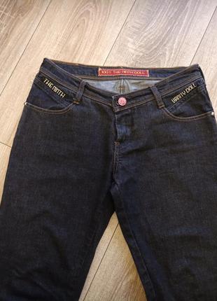 Джинсы серые