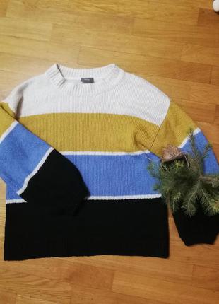 Смугастий светр з об'ємними рукавами