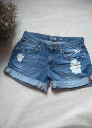 Рваные джинсовые шорты1 фото