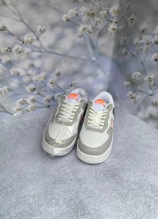 Женские демисезонные кожаные кроссовки низкие серые с розовым nike air force shadow🆕8 фото