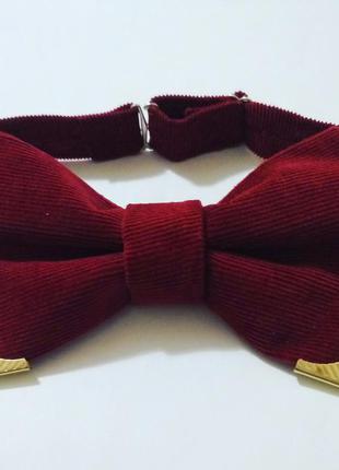 Бабочка на регулировке с золотыми угослками