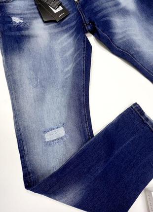 Цікаві чоловічі джинси c дірками3 фото