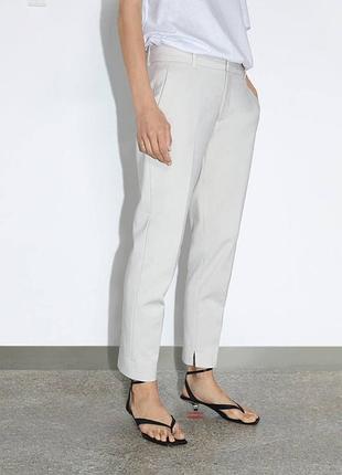 Бежевые брюки zara