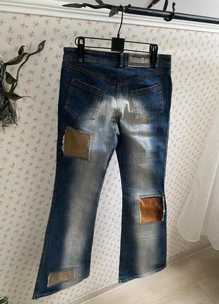 Трендовые стильные джинсы с имитацией заплаток2 фото