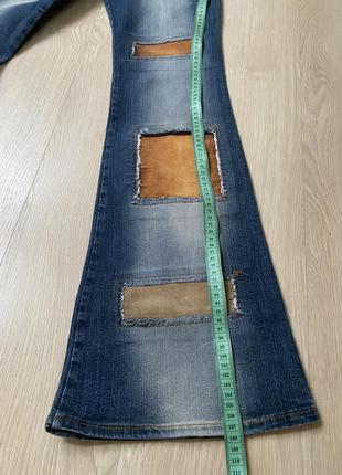 Трендовые стильные джинсы с имитацией заплаток5 фото