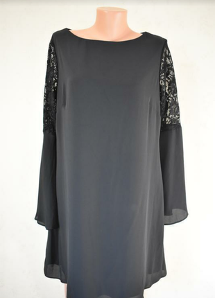 Чорне плаття з гіпюровими вставками на рукавах1 фото