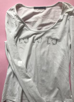 Біла бахавшая кофта дорогого бренду
