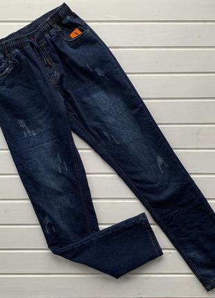 Подростковые утеплённые джинсы синие1 фото