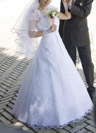 Весільну сукню.5 фото