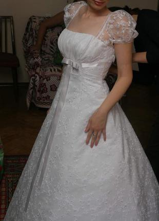 Весільну сукню.2 фото