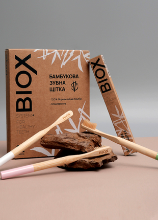 Фирменная зубная бамбуковая щетка biox (розовая)3 фото