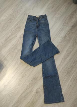 Джинсы клёш