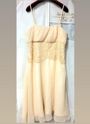 Сукня ніжна, легка, кремового кольору.  вишита на талії поїдками, з боку на блискавці2 фото