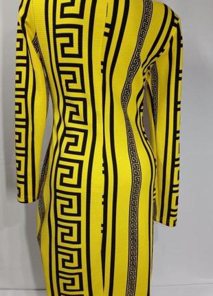 Модное стрейчевое женское желтое с чёрным платье с длинным рукавом3 фото
