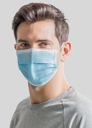 Маска трехслойная на резинках. защитная маска для лица. медицинская маска 1 штука7 фото