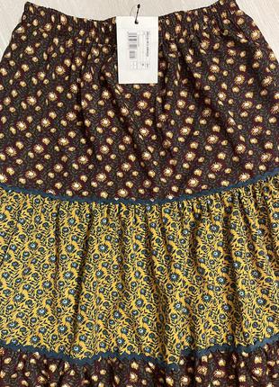 Очень красивая и стильная брендовая длинная юбка в цветочках.3 фото