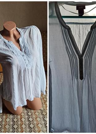 Тоненькая нежно-голубая рубашечка в идеале от 12-13 лет.