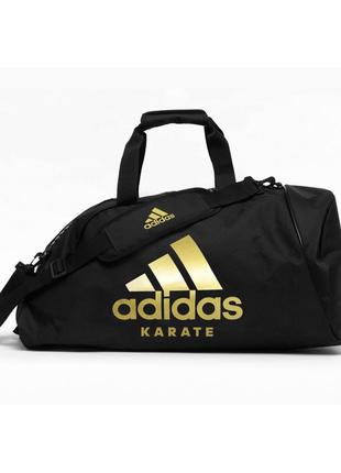 Спортивная сумка трансформер adidas, черная с золотым логотипом karate
