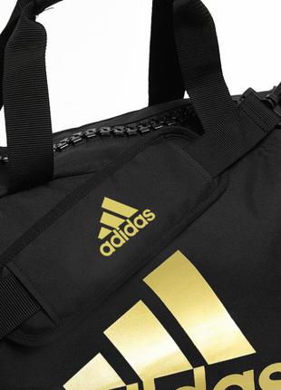 Спортивна сумка трансформер adidas, чорна з золотим логотипом karate3 фото