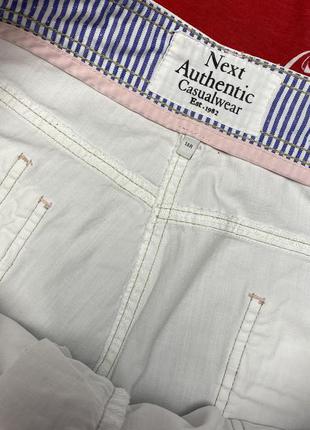 Белые шорты с контрастной строчкой.8 фото