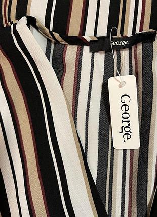 Очень красивая и стильная брендовая блузка в полоску.